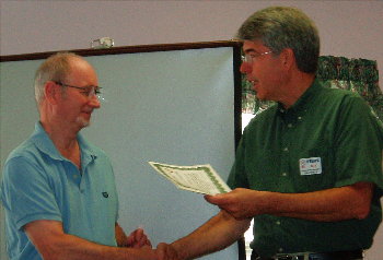 Larry Hughes - K3HE accepts Certificate of Appreciation on behalf of the Loudoun County Chapter of the American Red Cross. Photograph by AI2C - KE4FYL de Clarkes Gap, VA.