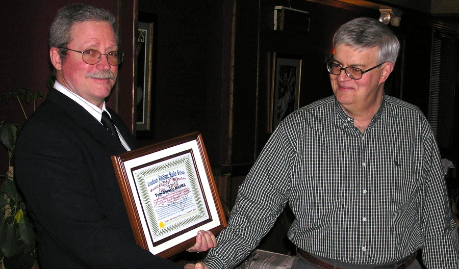 Tom Garasic - NA4MA of Haymarket, VA. receives LARG Outstanding Member for 2004 from President Dale Harrison - K3CN of Leesburg, VA. Photograph by Denny Boehler - KF4TJI of Leesburg, VA.