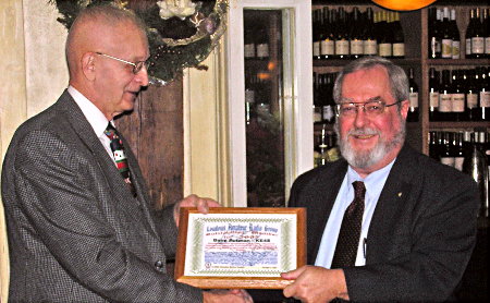 Dave Putman - KE4S is awarded the Outstanding Member of the Year by Norm Styer - AI2C. Photograph by Denny Boehler - KF4TJI of Leesburg, Virginia.