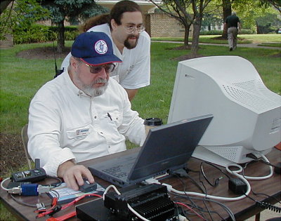 APRS Node by Dave Putman - KG4KZZ with Allon Stern - KE4FYL assisting. Photo by Norm Styer - AI2C.