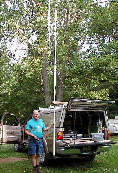 CrossBand_Repeater By Denny Boehler - KF4TJI operating on ridgeline southeast of Hamilton. Photograph by Norm Styer - AI2C.