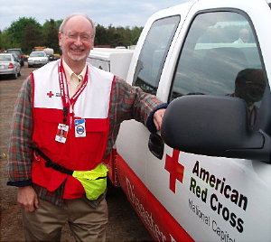 Larry Hughes - K3HE of Leesburg prepare to depart for the Red Cross Family Assistance site. Photograph by Norm Styer - AI2C de Clarkes Gap, VA.