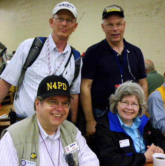 Nancy and myself with two friends from Alcatel days: on the left is John, WA1STU who lives in Haymarket, VA and is a member of the 'Ole Virginia Hams, the Manassas Club and on the right is Joel, W9NXM who now lives somewhere north of Chicago. Photograph by Paul Dluehosh - N4PD of Leesburg, VA.