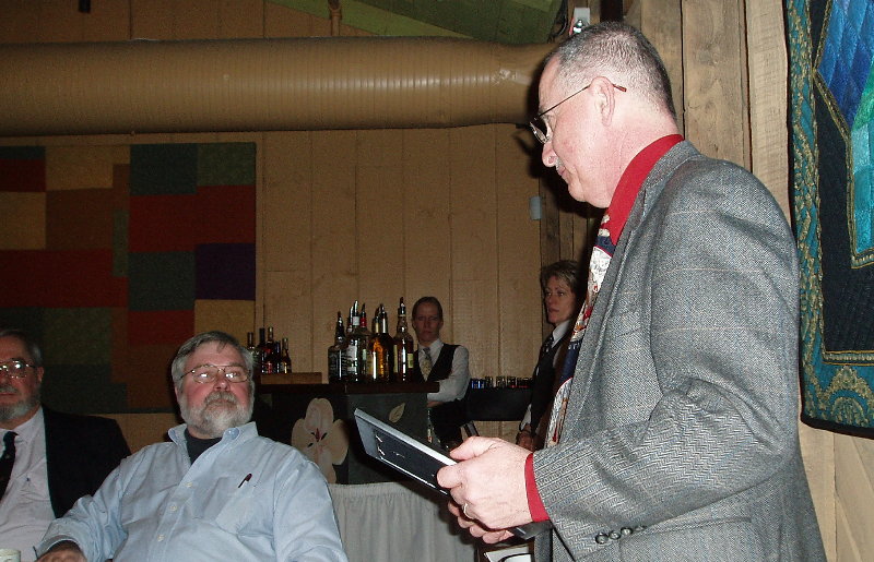 Gary Quinn - NC4S and Carol Boehler - KF4TJJ did the honors for the awards and door prizes. Photograph by Norm Styer - AI2C de Clarkes Gap, Virginia.