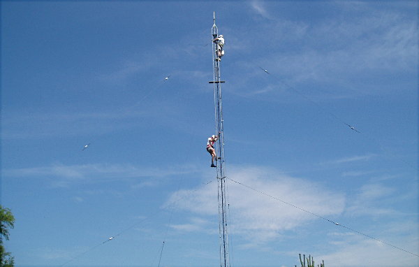 W4AU and NC4S Clearing Empty Tower. Photograph by Norm Styer - AI2C de Clarkes Gap, VA.