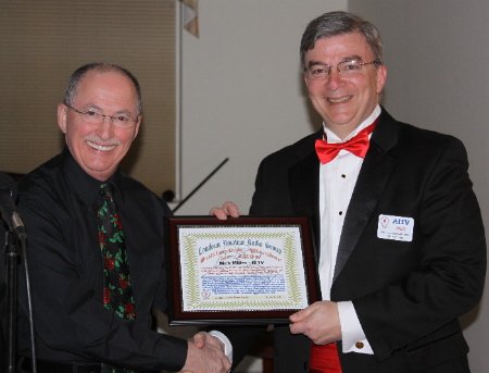 Rick Miller - AI1V receives Outstanding Momber for 2009 Award from Gary Quinn - NC4S. Photogrpah by Norm Styer - AI2C de Clarkes Gap, Virginia.