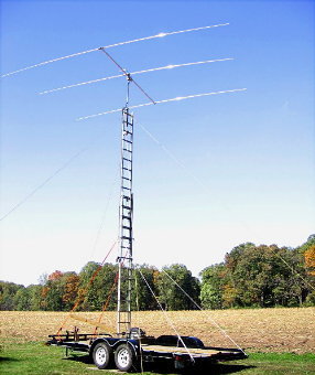 The portable auto-hauler mounted 15M ladder-supported yagi by Norm Styer - AI2C. Photograph by Larry Hughes - K3HE de Leesburg, Virginia.