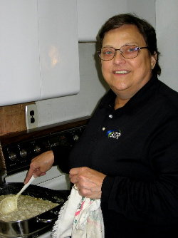 BA Buchholz, our Class A Cook works on the Saturday evening meal. Photograph by Larry Hughes - K3HE of Leesburg, Virginia.