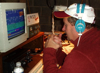 Mark Johnson - W3ZI concentrates on 160M CW waiting for a reply to an automatic CQ. Photograph by Norm Styer - AI2C de Clarkes Gap, Virginia.